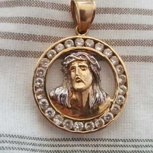 10K gold and cubic zirconia Jesus pendant.